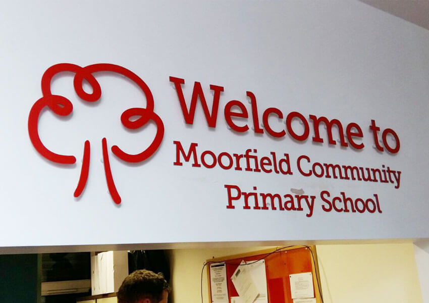 Cut lettering welcoming visitors to the school.