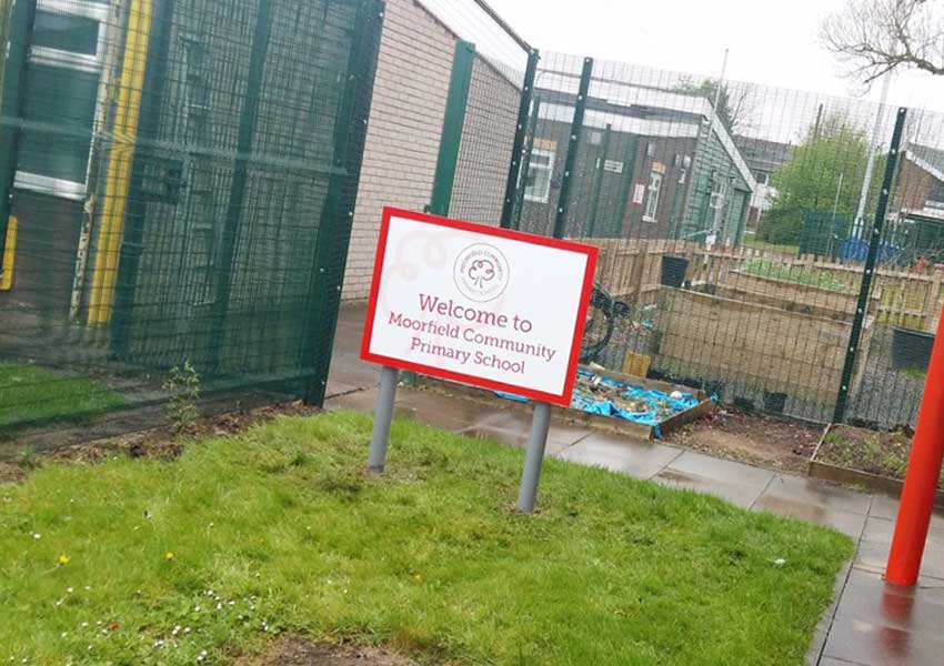 A welcome sign for school visitors.
