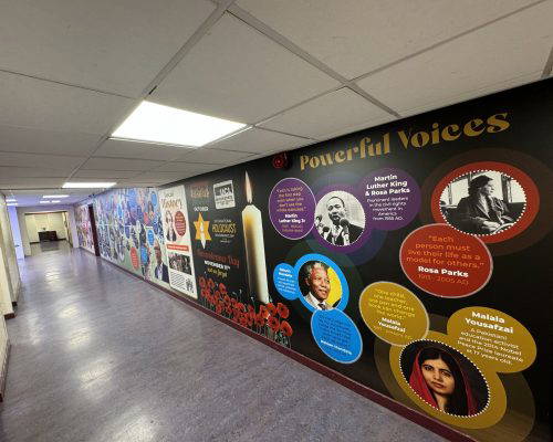 Powerful voices wall display in a school corridor. Designed, manufactured and installed by Design for Education.