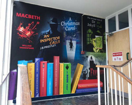 Inspirational English wall art installed in a staircase by Design for Education at Bradon Forest school.