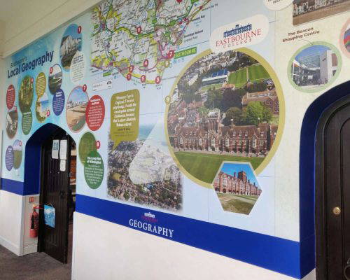 geography-mural-showing-eastbourne-local-area School wall art featuring Eastbourne's local geography. Bespoke wall murals and classroom wall displays. Wall display showing local areas of interest. Designed, manufactured and installed by Design for Education