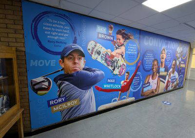 The Weston Road Academy sports wall art showing golf and sakteboarding.
