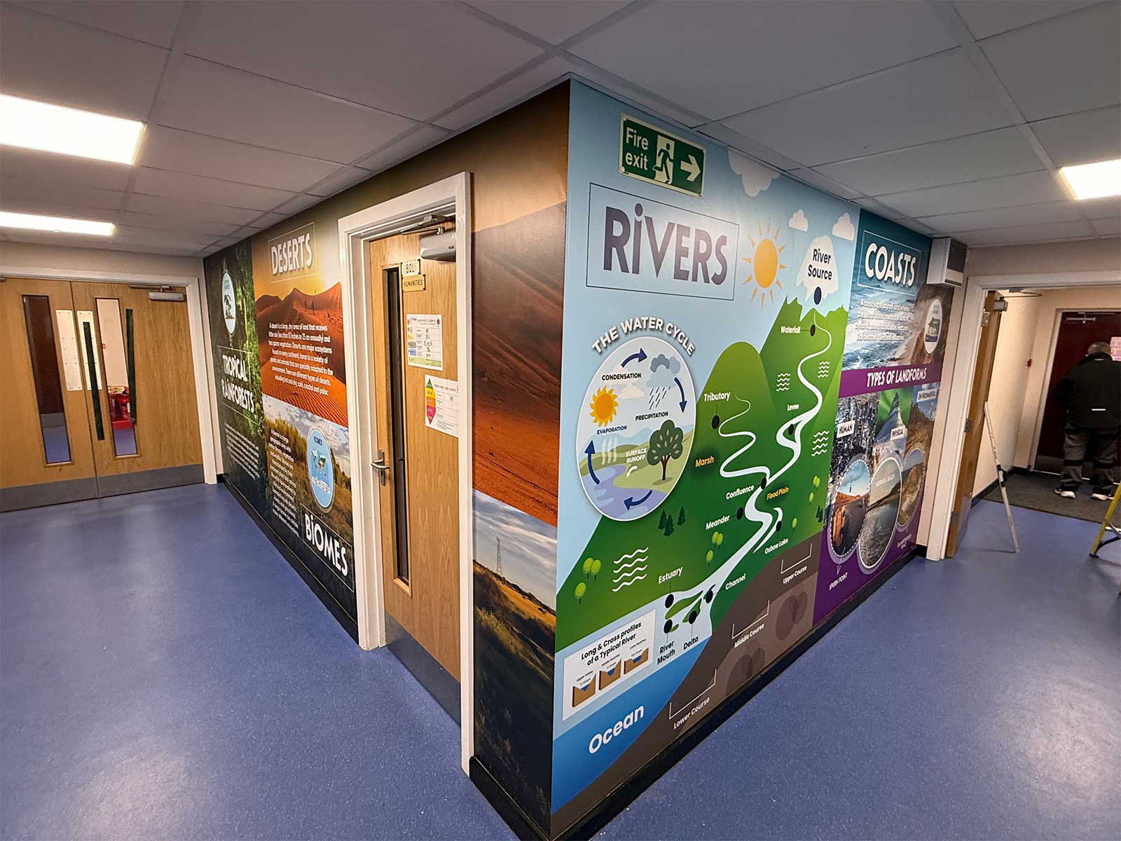 Modern learning environment design in a secondary school corridor featuring curriculum WOW walls.