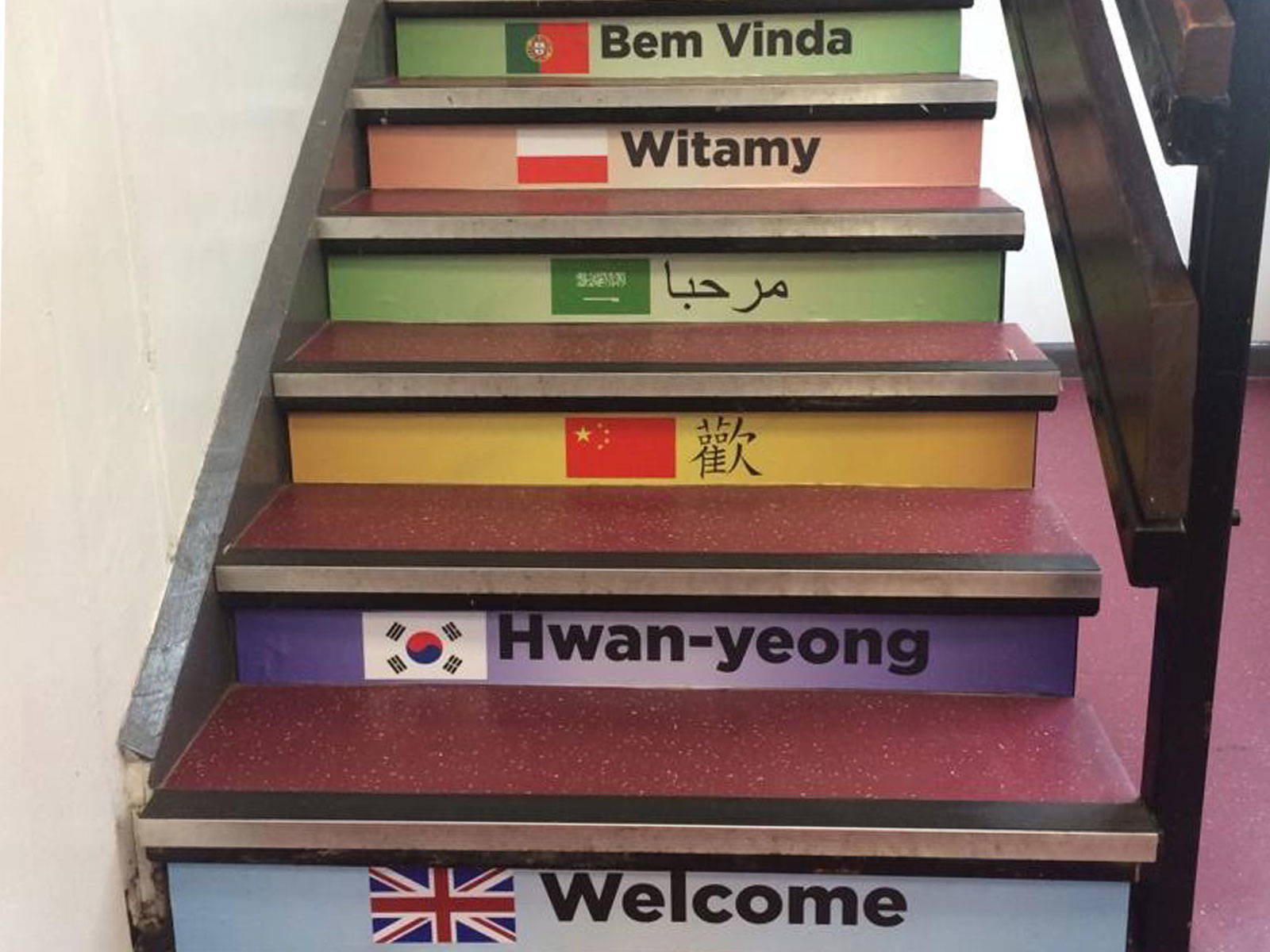 Languages wall graphics featuring multilingual welcome stair risers